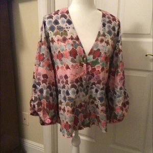 Colorful Alexis blouse with elbow bubble sleeves.